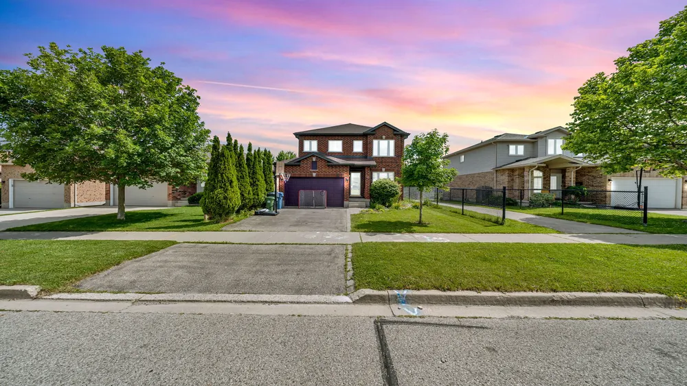Sunset exterior of 31 Ingram Drive, Guelph